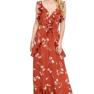 Ruffly low neck maxi dress.